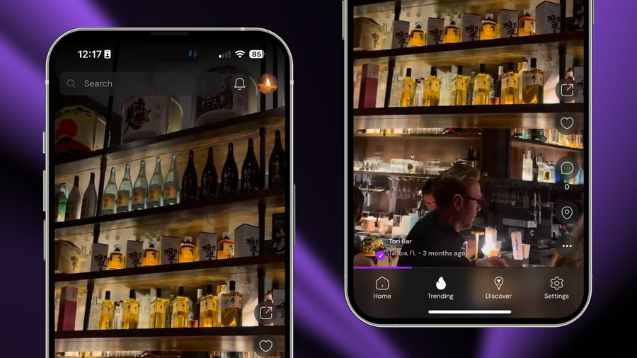 Two smartphones display a dimly lit bar scene with shelves filled with various bottles of alcohol. One phone shows a close-up of a bartender preparing drinks, while the other screen features a navigation interface with options like Home, Trending, and Discover.
