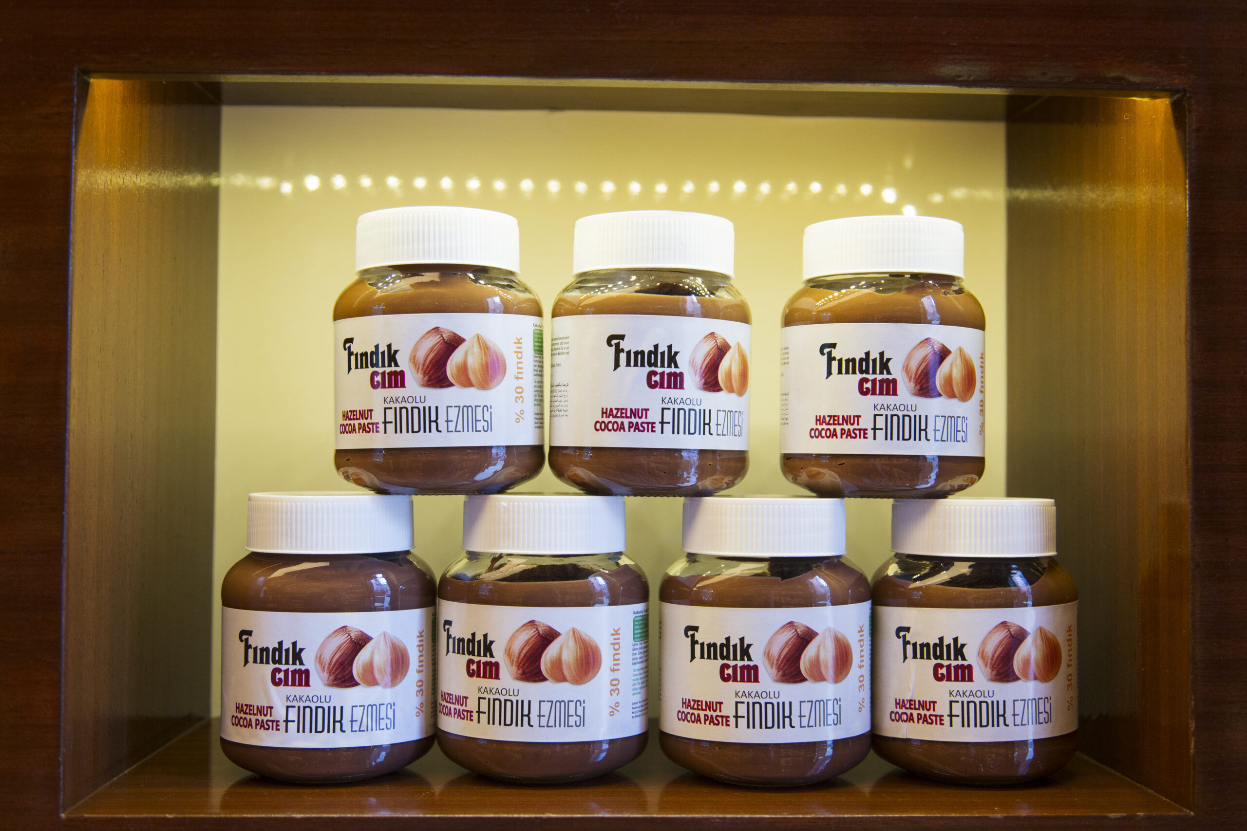 Jars of hazelnut paste on a shelf at the Findik Evi Black Sea Chocolate Shop, Giresun, Turkey.