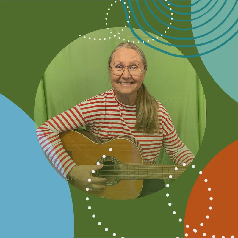 En person med gitarr