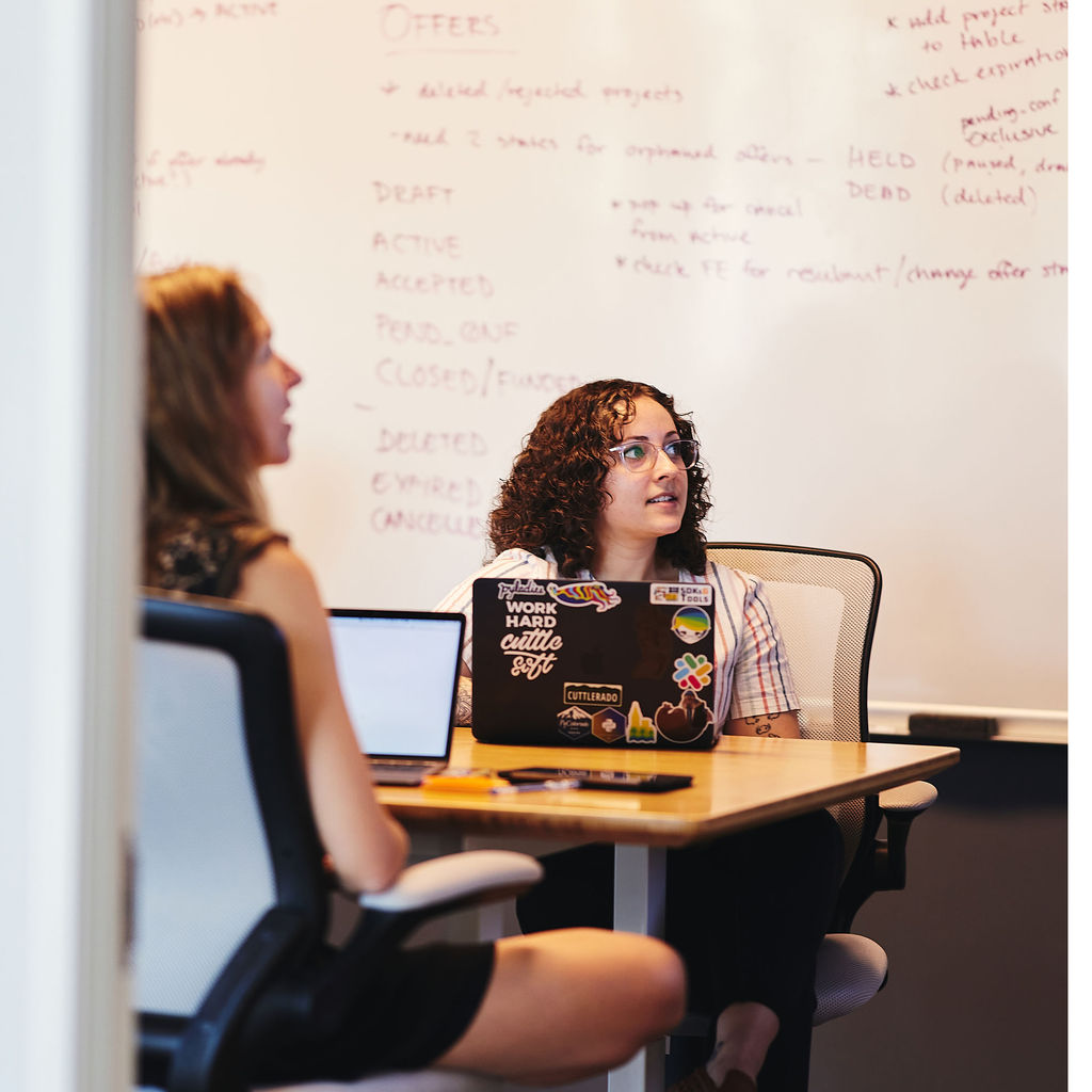 Sara and Marisa review the test cases for a new Android app.