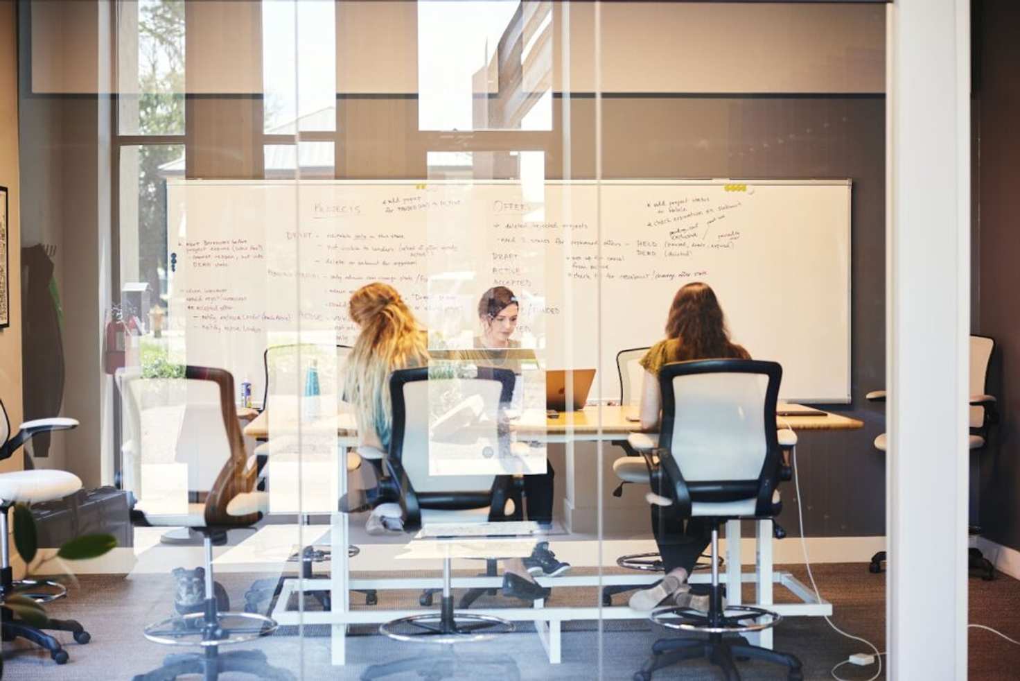 Cuttlesoft's leadership team in a software design and planning meeting at our Denver headquarters