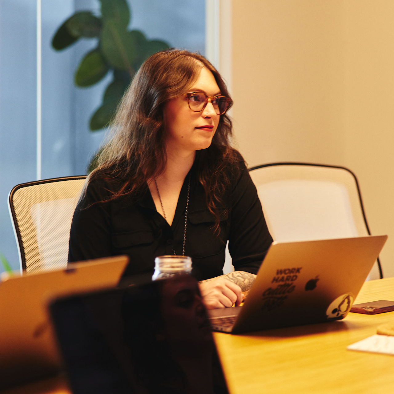Emily sits in on a meeting regarding a new Python data analysis project.