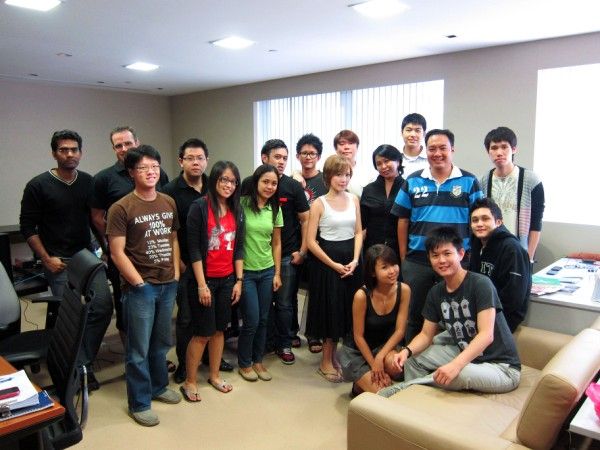 Aws team members gathered together at an event