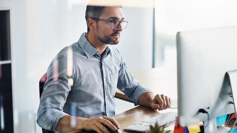 Legal team collaborating around a conference table with