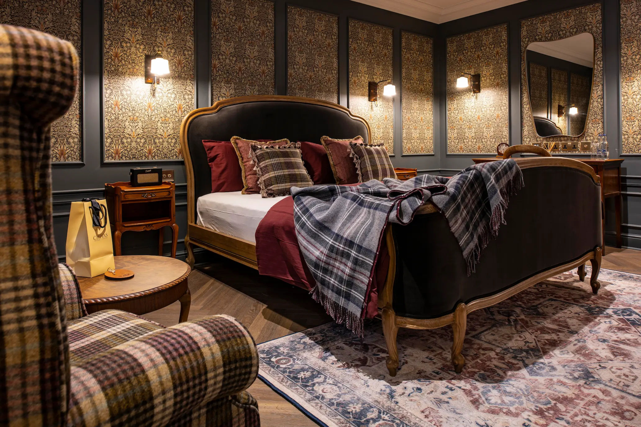 The traditional Dalmunach bedroom with tartan furnishings.