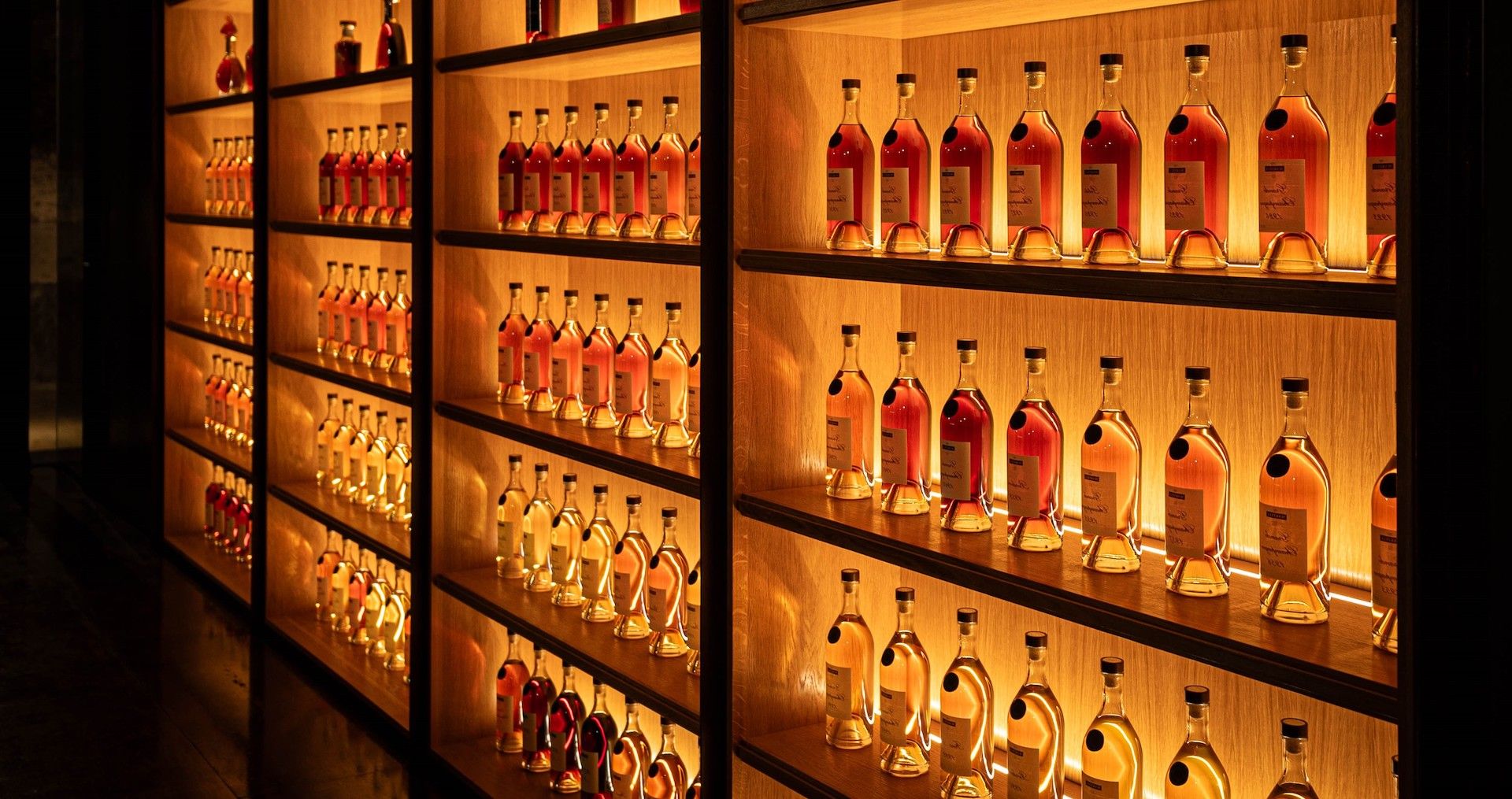 Wall of Cognac bottles