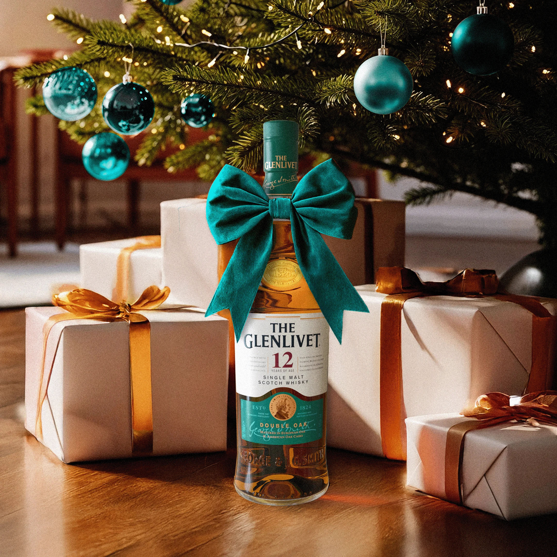 Gifted Whisky bottled under a Christmas tree with presents