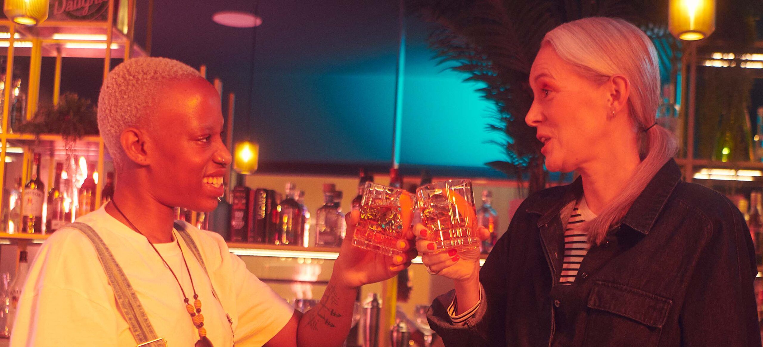 whisky drinkers at the bar