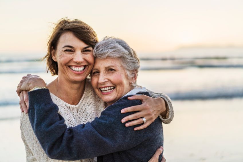 Happy woman and her elderly Mum