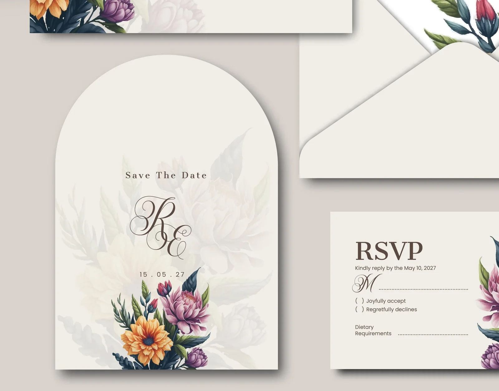 Floral wedding invitation suite with a save the date card, lined envelope, and RSVP card