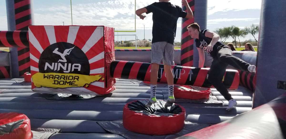 https://ik.imagekit.io/czzfxeud6c/EventBookr/members/6a323bd6a0464a3a4d0137ea/Ninja_Warrior_Inflatable_Challenge_Game_Rental_for_Active_Phoenix_Events_qdAzoIHkJ.webp