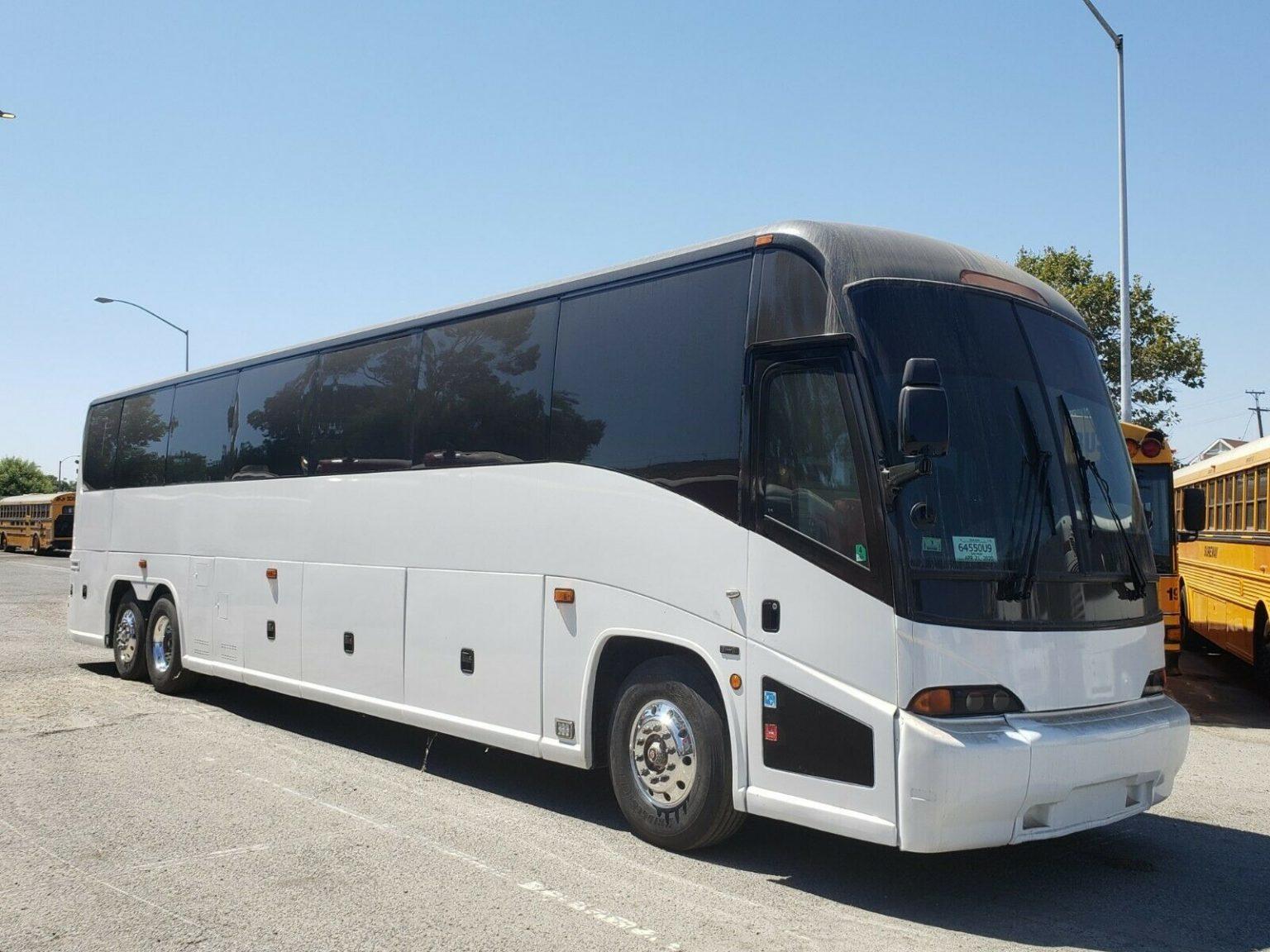 2003 MCI J4500 54 Passenger Coach Bus Buses for sale