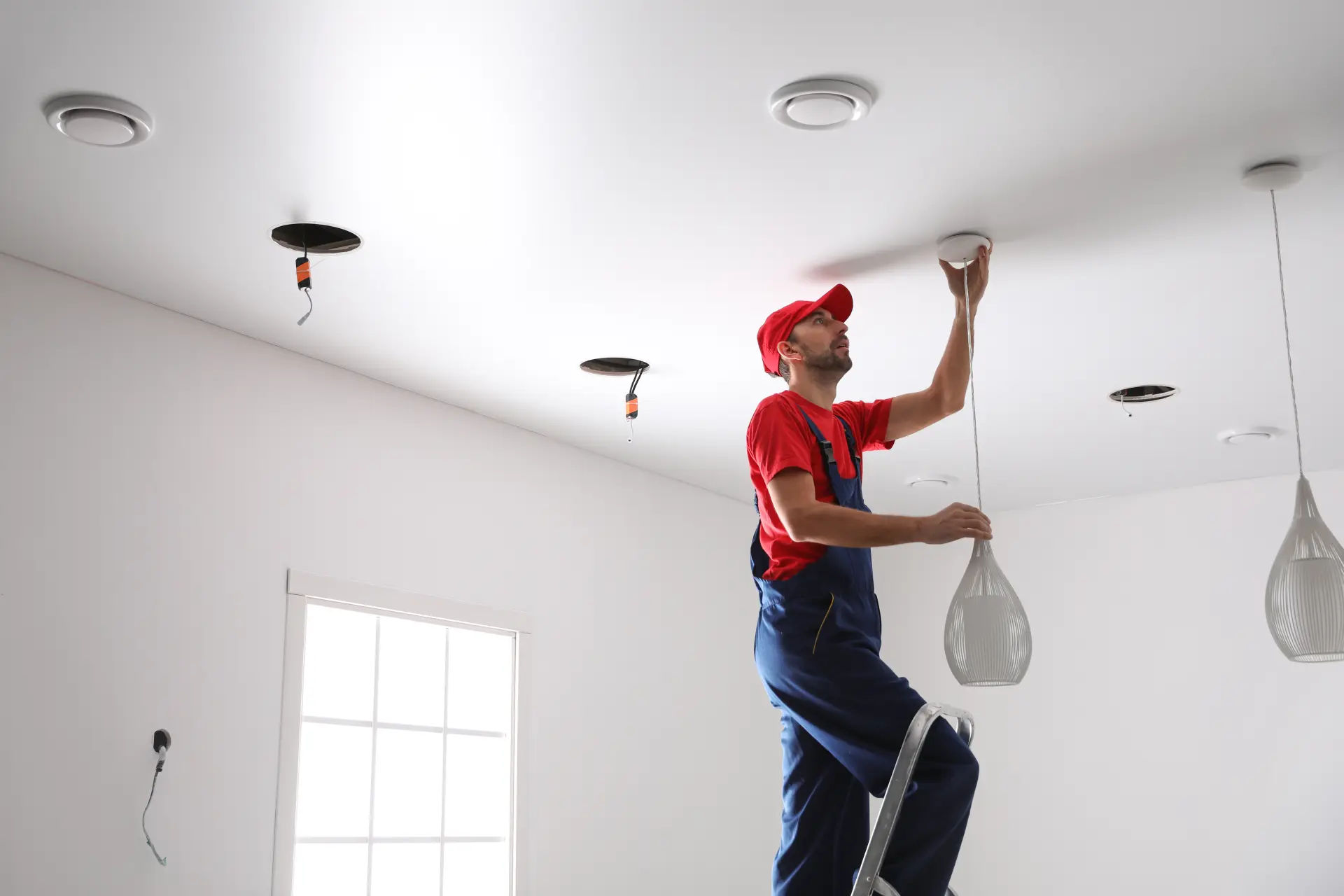 A light switch being checked