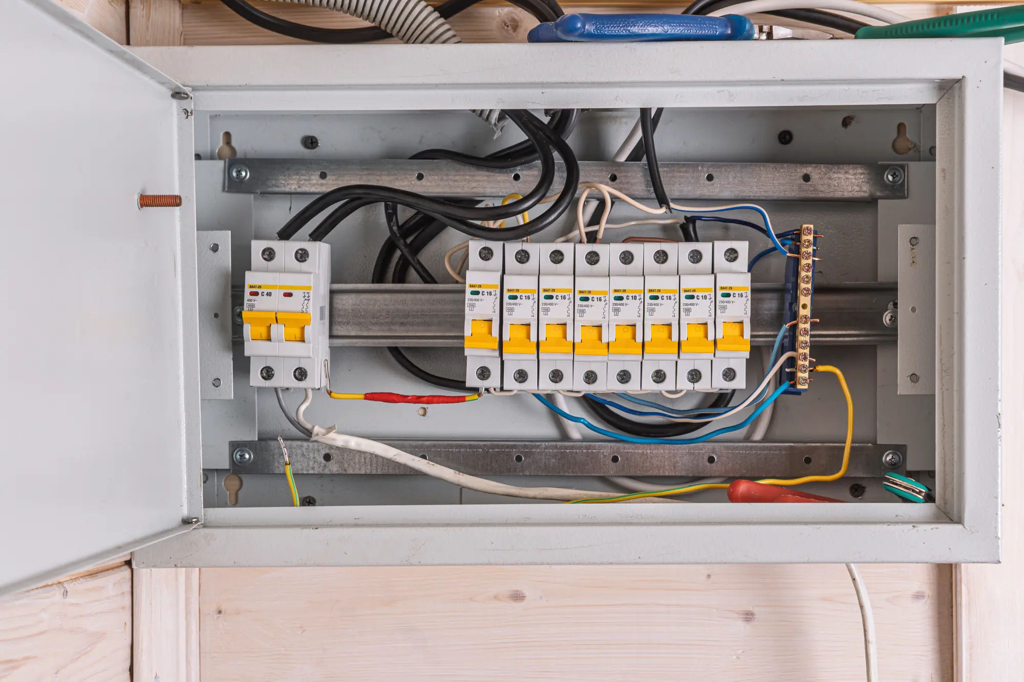 Electrician checking a consumer unit