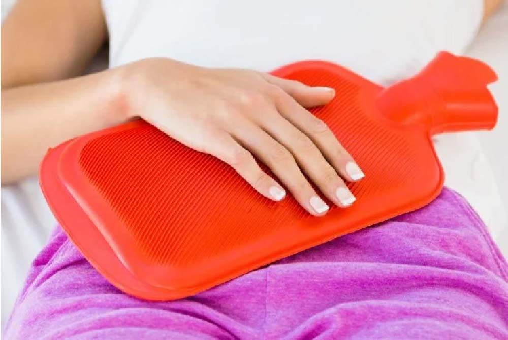 Heat therapy for menstrual cramps: Hot water bottles and heating pads
