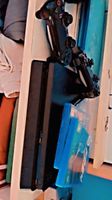 PlayStation 4 Slim 1000Go + 2 manettes + 3 CD