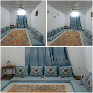 Salon somali avec rideaux en bon état