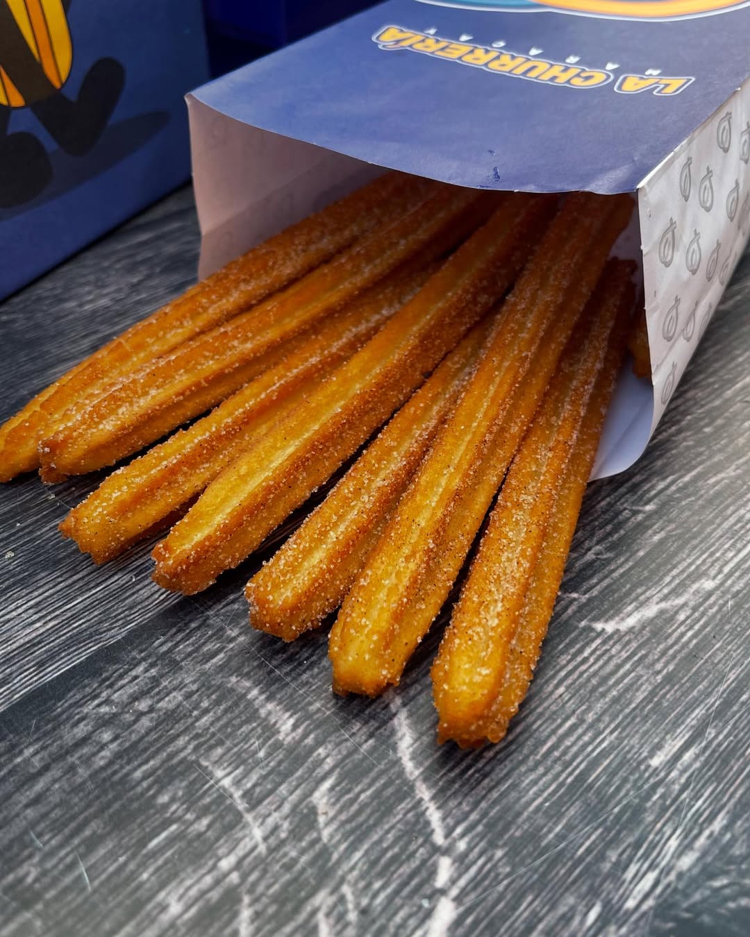 Churros con azúcar y canela