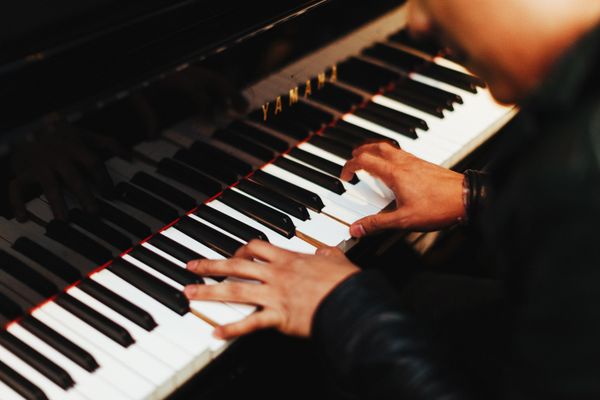 musician playing piano 