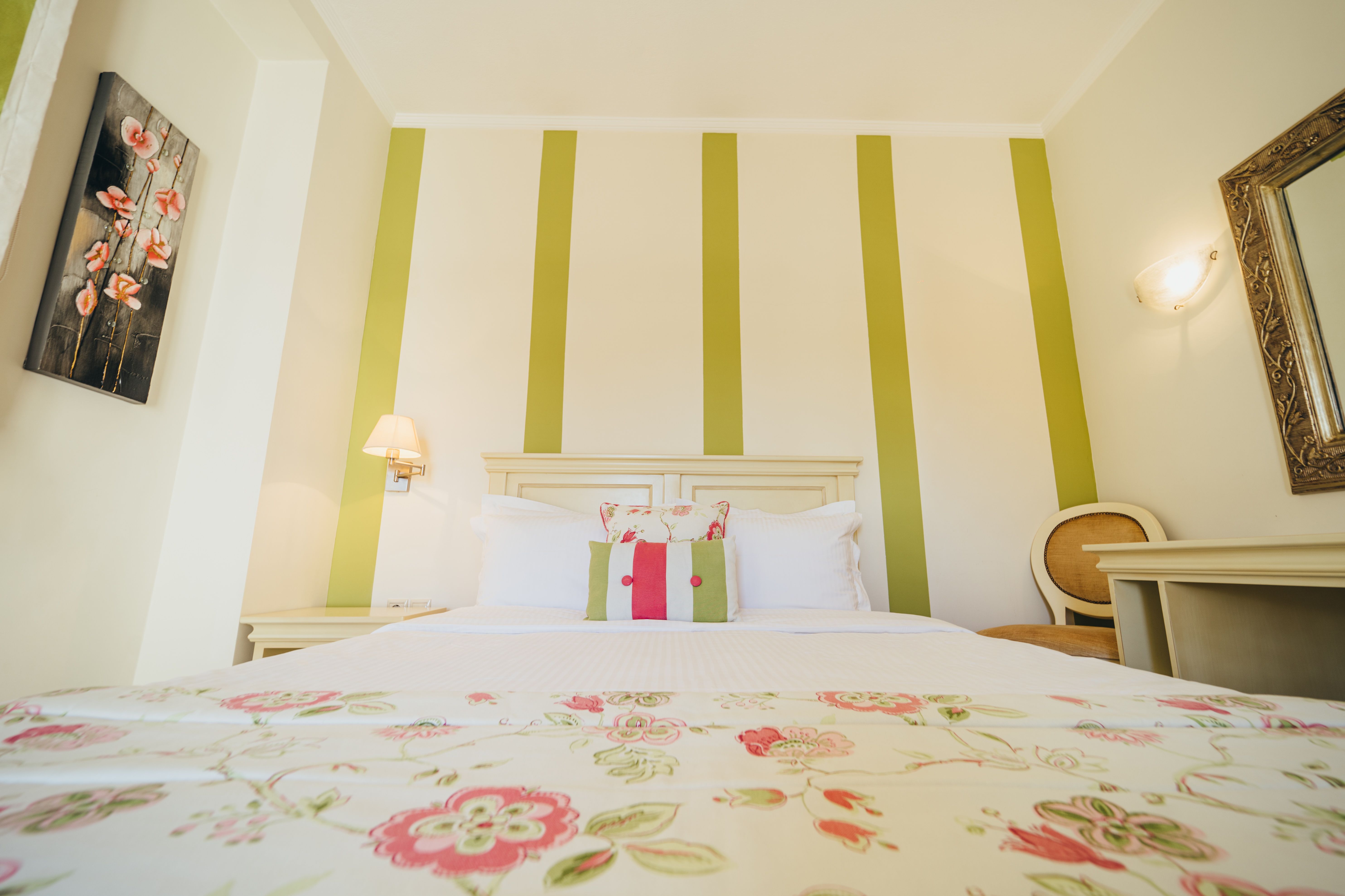 Double bed with pillows in standard room