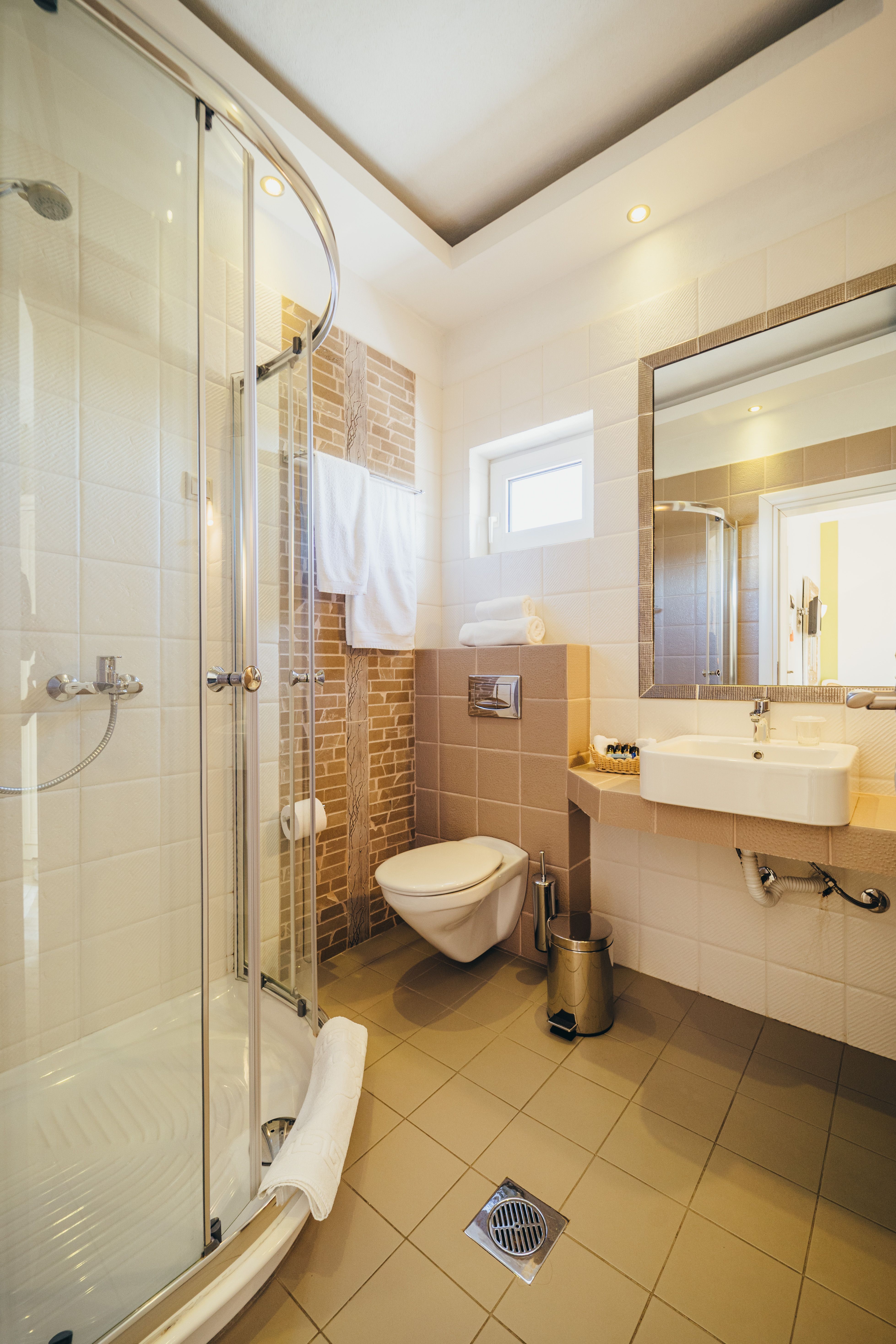 Bathroom interior with shower cabin in standard room