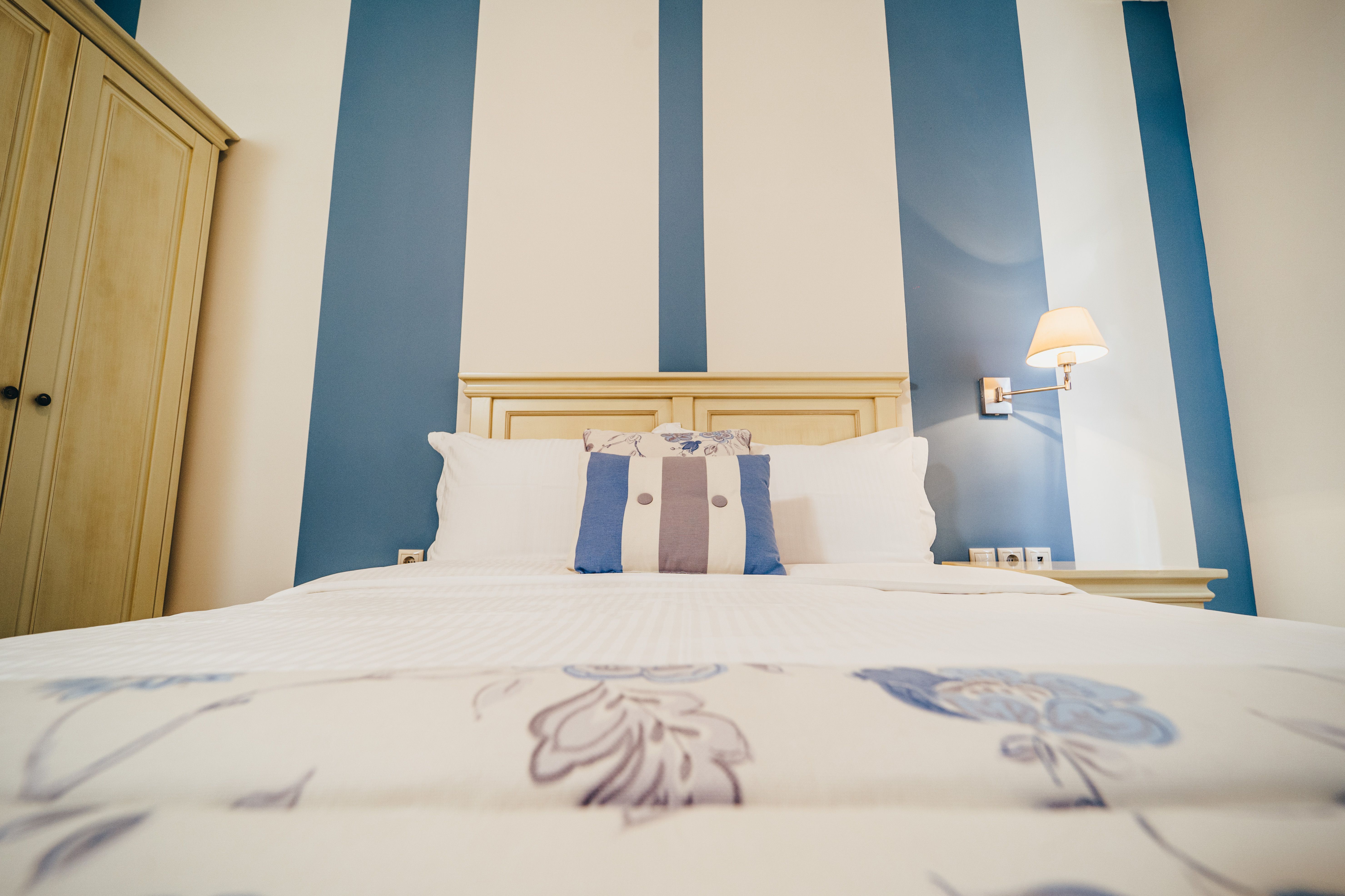 Double bed with pillows in budget room