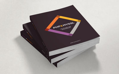 Photo of three copies of PHP and MySQL book in a stack