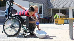 Volunteers for holiday day care for children with disabilities