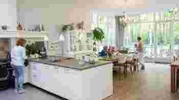 Washing and ironing clothes with and for residents with dementia.