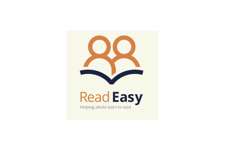 A cream logo with the outline of two people over an open book with the words Read Easy Helping adults learn to read underneath