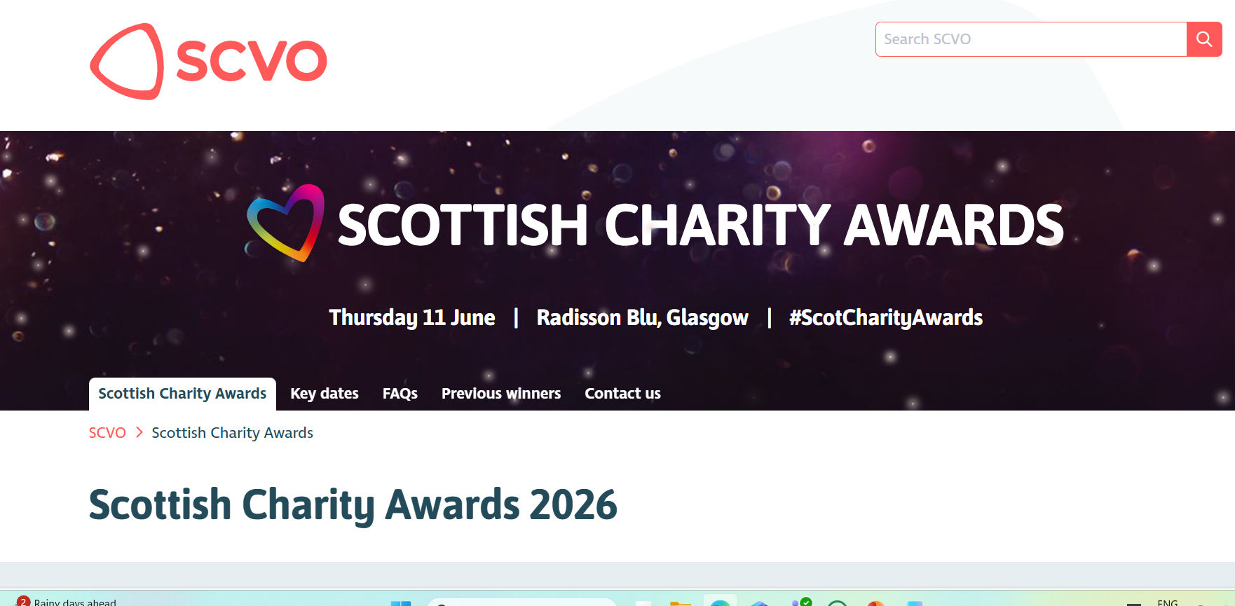 Screenshot of the SCVO website. The heading is Scottish Charity Awards 2026. The banner is dark purple with bubbles pictured in the background. The Scottish Charity Awards logo is a rainbow coloured line drawing of a heart. Scottish Charity Awards Thursday 11 June - Radisson Blu, Glasgow - #ScotCharityAwards