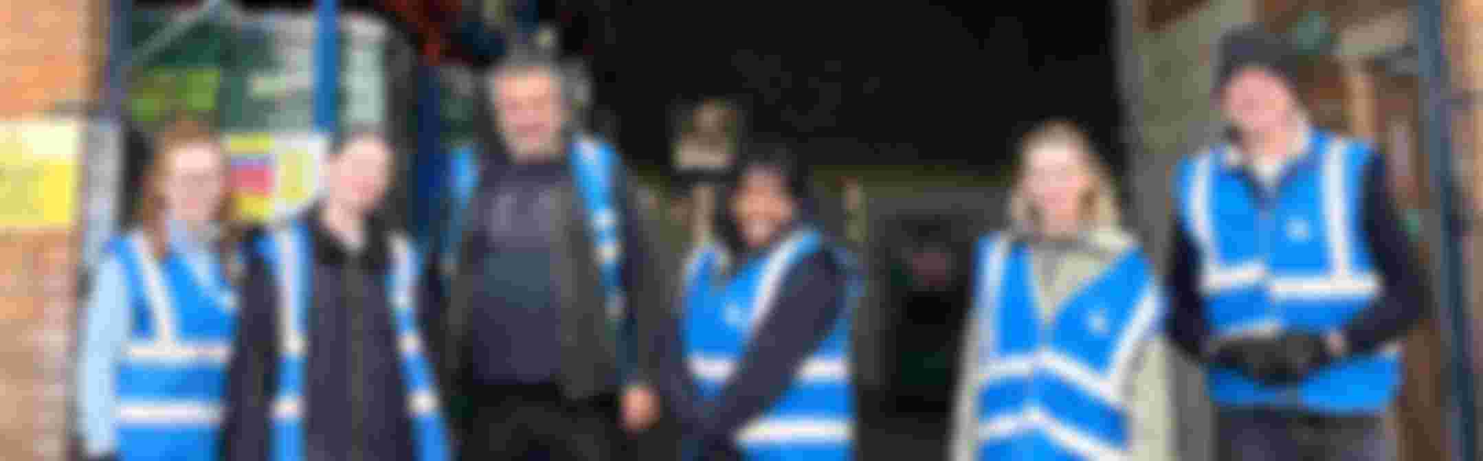 A group of six people volunteering at a charity in Birmingham A group of six people volunteering at a charity in Birmingham