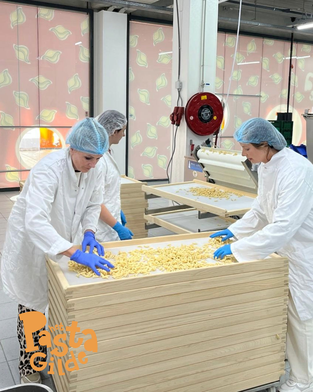 Volunteers at our pasta production facility for the Foodbanks