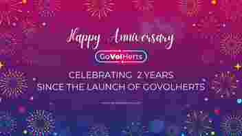 Pink and purple design with white text and fireworks, GoVolHerts logo and text "Happy Anniversary", "Celebrating 2 Years Since the launch of GoVolHerts", www.govolherts.org.uk