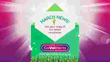 March News - Green envelope with a letter coming out the top with March News written on it, and the GoVolHerts logo on the envelope