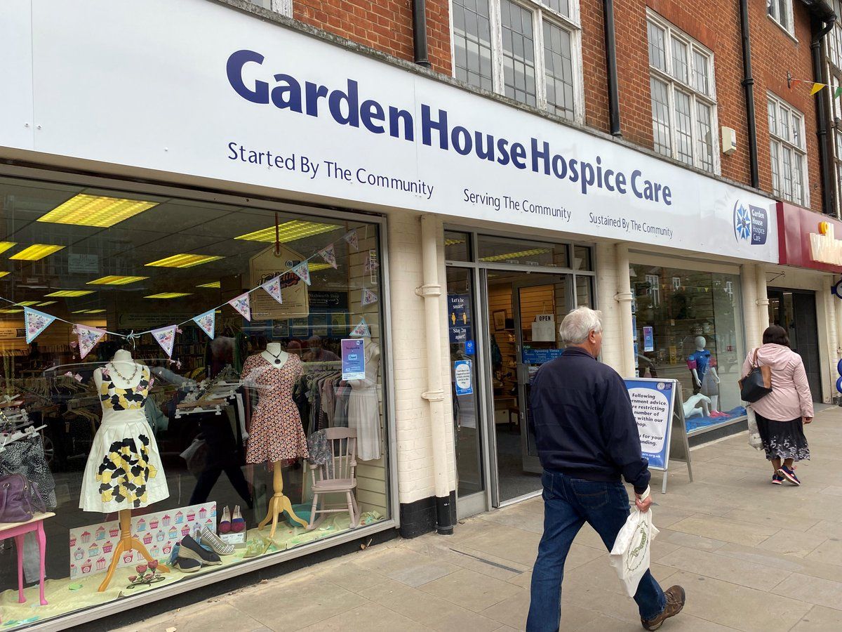Retail volunteer for a bustling second-hand furniture shop