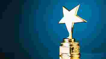 Gold star trophy with blue background
