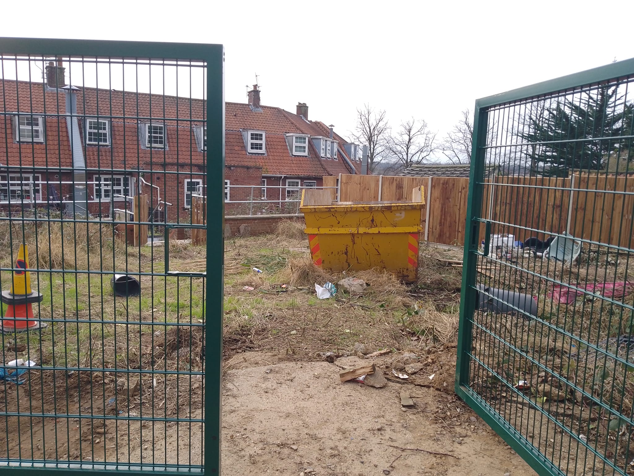 Clearing and preparing the ground for a new community garden