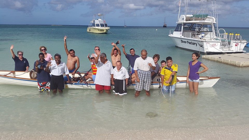 A motor boat driver to assist the rowers.