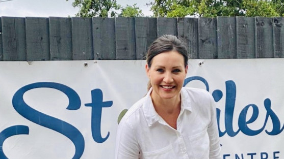 Natalie and a rescue dog at St. Giles