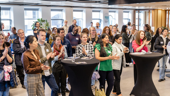 On the 6th of October, Volunteer The Hague held its semi-annual Mix & Match Volunteer Job Fair at The Humanity Hub. The event brought together local residents and various non-profit organisations to connect internationals with volunteer opportunities in the community. The Mix & Match fair featured 25 organisations, all focusing on a variety of fields and interests, including human rights, social justice, elderly care, animal and environmental causes, and so much more. Each organisation had a booth where they could share information about their mission and the types of volunteer work available. The event attracted more than 150 visitors from The Hague region. Many of the attendees were interested in volunteering for the first time, while others were looking for new opportunities. We were honoured to have Jan van Zanen, the mayor of The Hague, open the event with a welcome address to the international community. International volunteers often have a great deal of knowledge and expertise to make a significant contribution to society, said Jan van Zanen. The mayor highlighted the contribution of voluntary work to the strength of the city and thanked those willing to volunteer. Besides the booths representing local non-profits, there were two workshops for the attendees willing to make a career transition or find new opportunities. Elena Mellara gave a presentation on how to use volunteering and internships as leverage for job success, followed by free one-on-one CV advice power meetings. Another highlight of the event was the presentation on how volunteering can sharpen your current skills and impact your professional life by Tetyana Benzeroual, Project Lead of Volunteer The Hague. Feedback The October edition of the Mix & Match Volunteer Job Fair was a great success, with many participants expressing gratitude for the chance to come together and make a positive impact on their community. The event showcased the many ways that volunteering can be a fulfilling and rewarding experience for people of all ages and walks of life. It goes without saying that the Mix & Match Fair was also a fantastic opportunity to meet other expats and share experiences and tips about living in The Hague region. All in all, 92% of the attendees rated the event as “Very Good” and “Good”, and 69% reported that they intend to make use of the information they received at the event immediately. Some testimonials “There was a great amount of diversity in what was being offered, it did feel like there was something for everyone” “Very well-organised and inspiring” “I appreciated the enthusiasm of the people working and volunteering for the organizations represented” Save the date The next edition of the Mix & Match Volunteer Job Fair will take place on the 13th of May at The Social Hub. We look forward to welcoming you there!