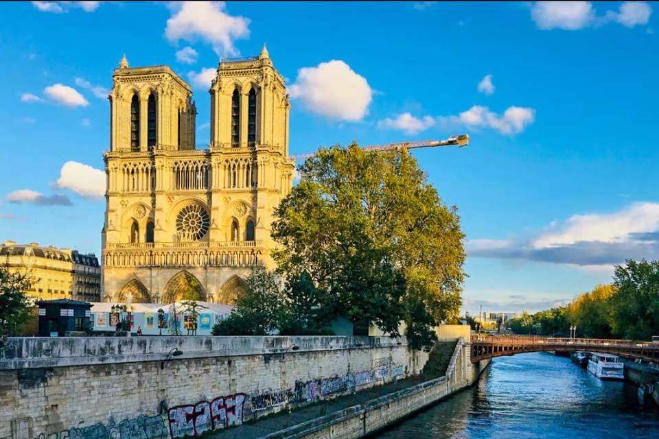 Notre-Dame Cathedral Entry with District Walking Tour and Seine River Cruise Ticket