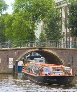 City Sightseeing: Amsterdam Hop-On, Hop-Off + Canal Cruise