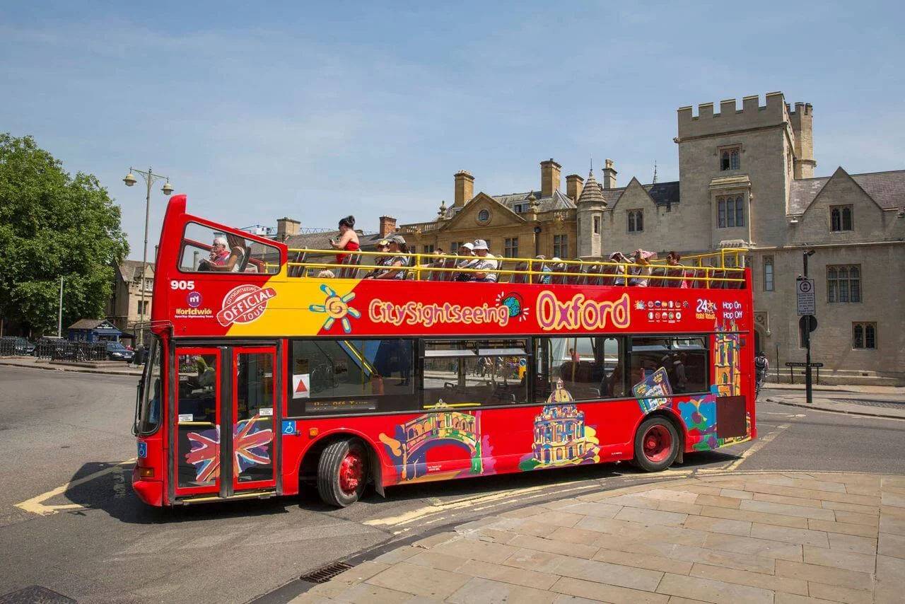 red City Sightseeing hop-on hop-off open-top double-decker bus operating in Oxford, England