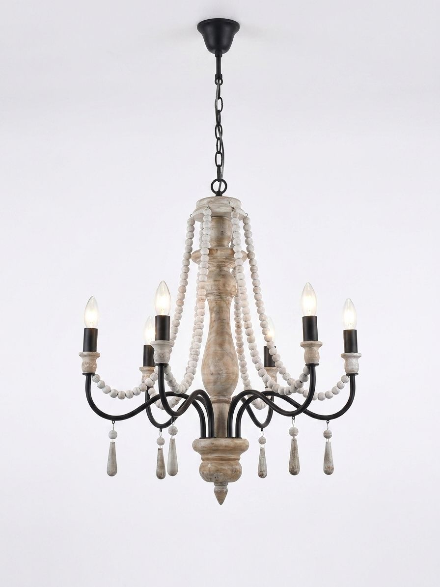 Crown, a iron and wood and beads chandelier, studio photograph on a white background
