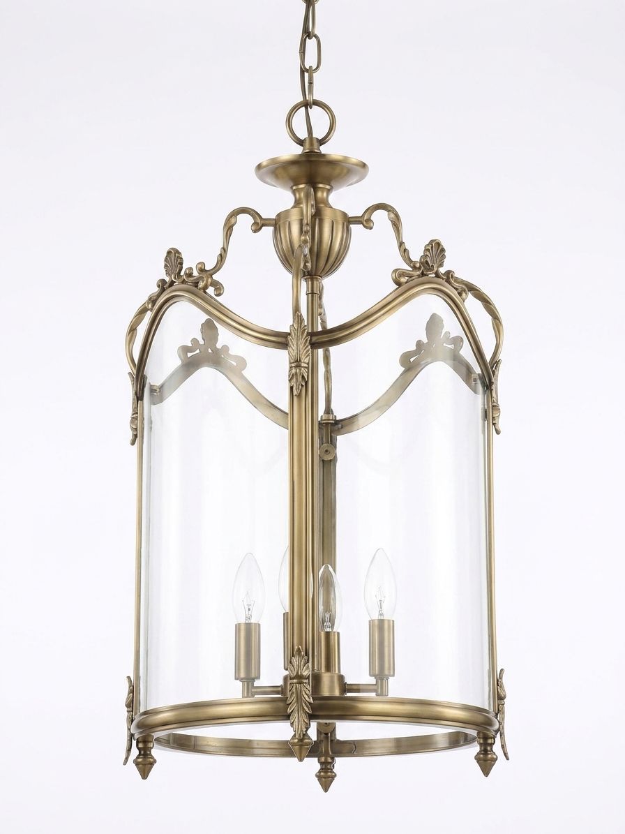 Glass, a brass and glass chandelier, studio photograph on a white background