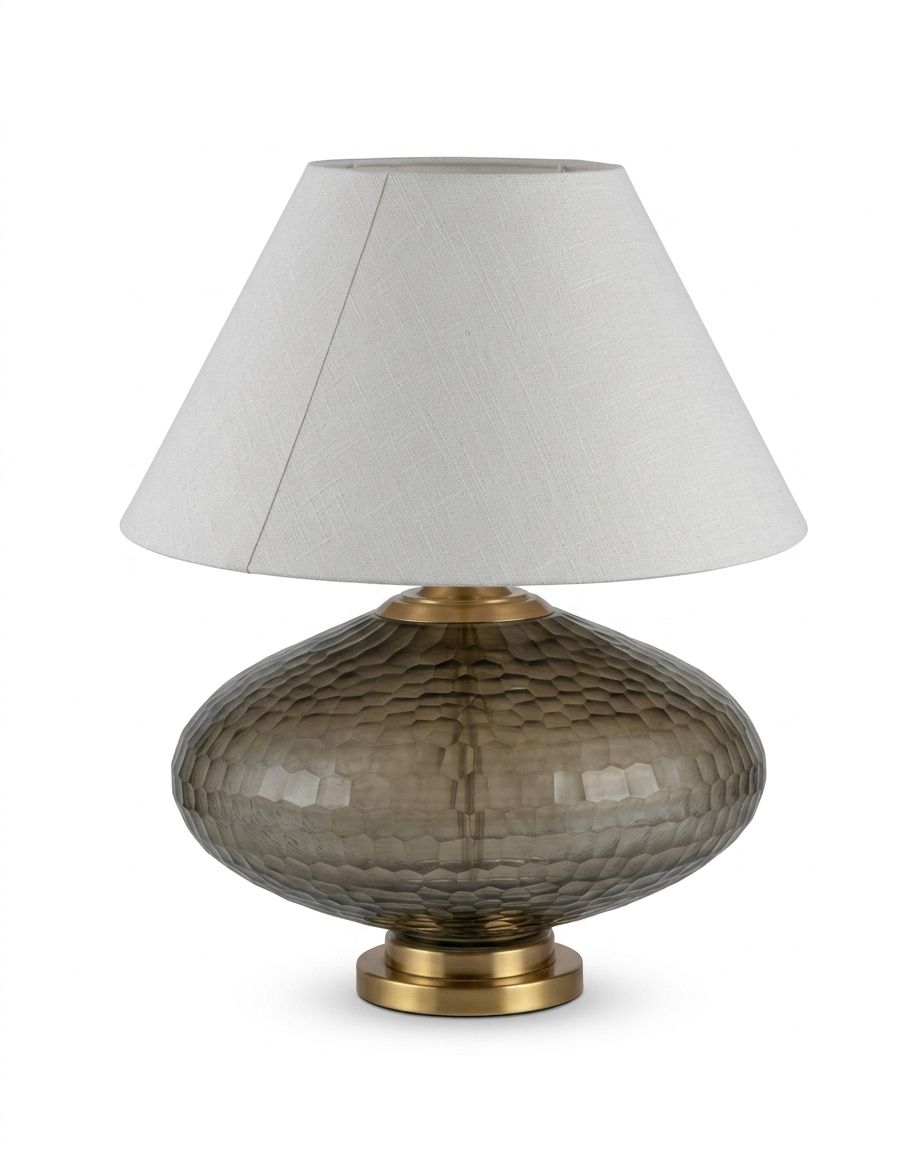 Smoked Glass Disc Table Lamp, a glass and fabric and brass table lamp, studio photograph on a white background