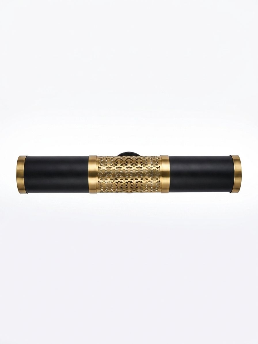 Brass Cylinder Vanity Light, a brass wall light, studio photograph on a white background