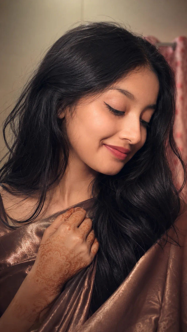 Cinematic Mehndi Portrait in Brown Saree — ChatGPT prompt | pineprompts.com