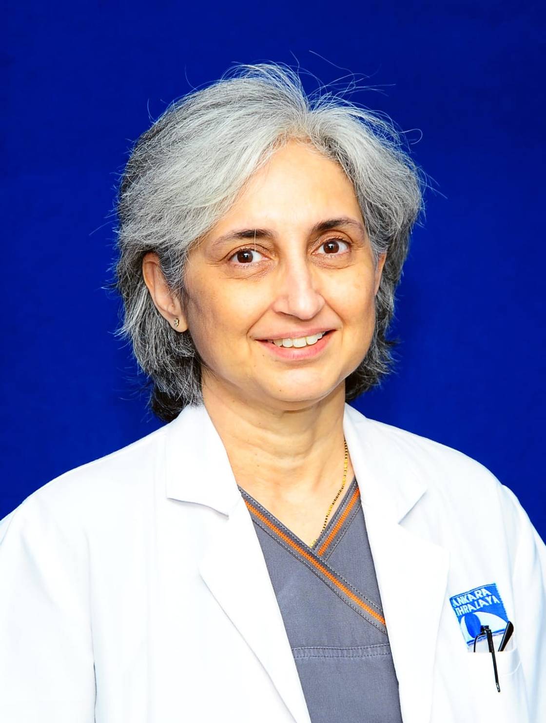 Dr Muna Bhende